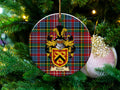 Baron Scottish clan ceramic ornament with family crest on a Caledonia tartan background, hanging on a Christmas tree