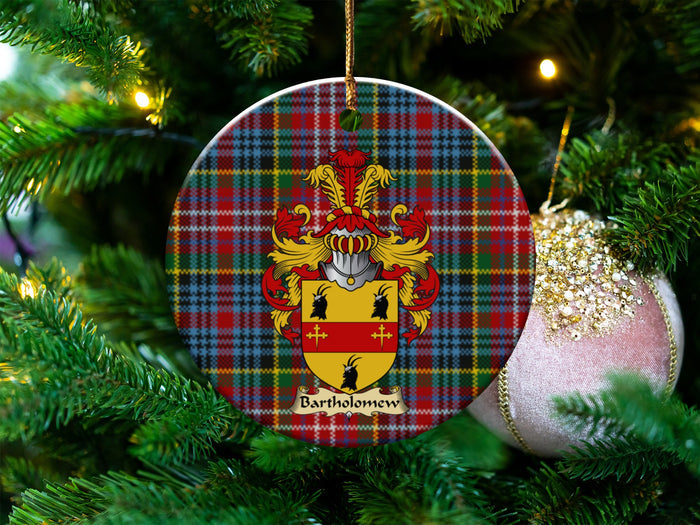 Bartholomew Scottish clan ceramic ornament with family crest on a Caledonia tartan background, hanging on a Christmas tree