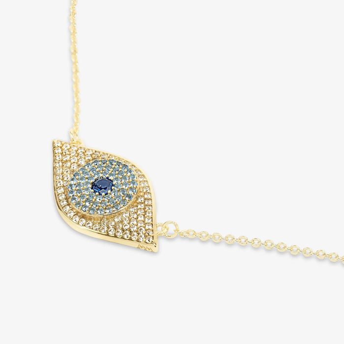 Gold Blue Evil Eye Necklace with white diamondette accents by Melinda Maria, featuring a detailed evil eye charm on a delicate chain.