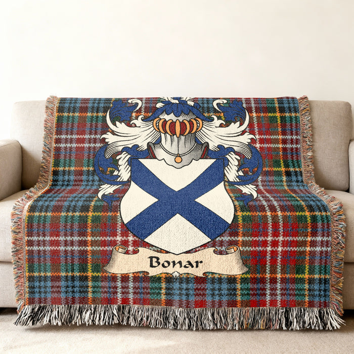 Bonar Scottish family shield woven blanket on a Caledonia tartan background