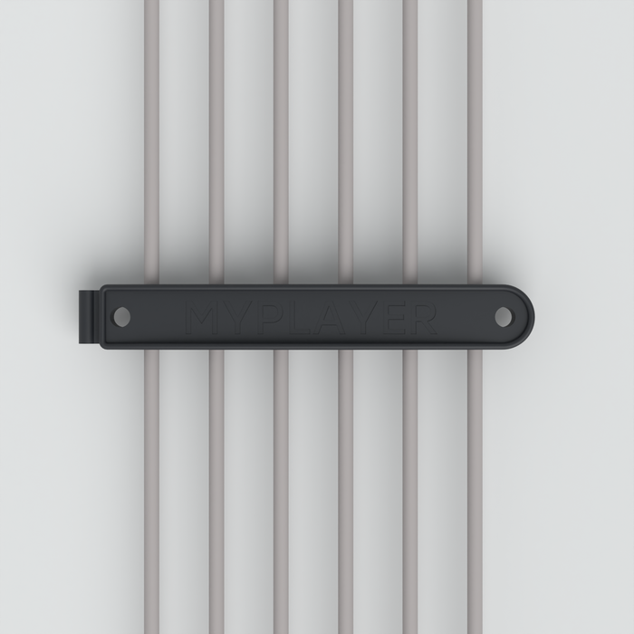Cable clip holding multiple cables on a retail display electronics tray