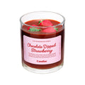 Chocolate dipped strawberry candle by Candier, wax candle shaped like a strawberry dipped in chocolate, on a neutral background.
