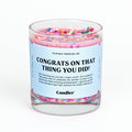Candier congratulation candle with a simple white wax design and "Congrats" engraved on the surface, ideal for celebrations.