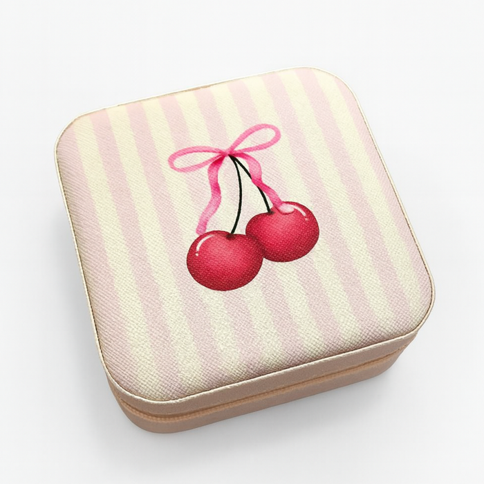 Private label Coquette jewelry organizer travel pouch with multiple compartments for necklaces, rings, and earrings.