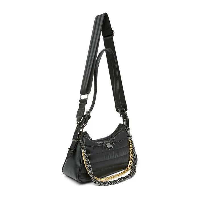 Think Royln Cosmopolitan bag in a stylish design, showcasing its unique shape and color details.