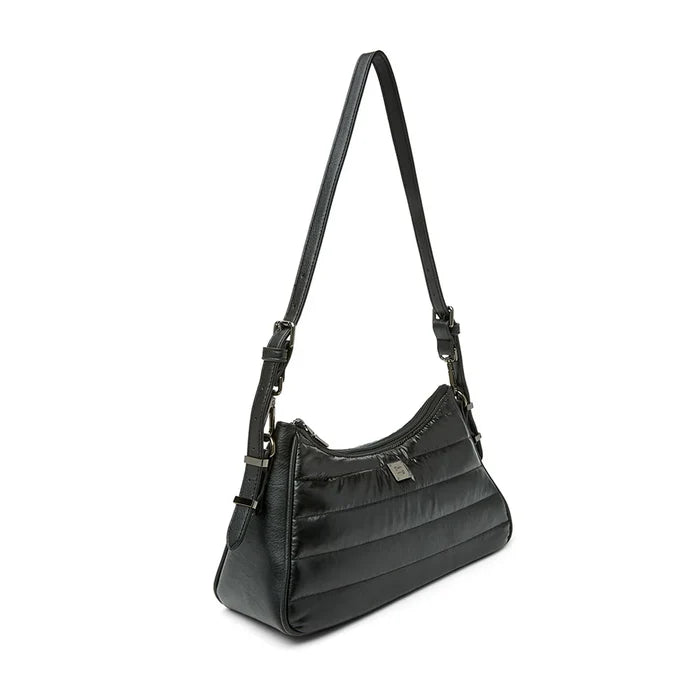 Think Royln Cosmopolitan bag in a stylish design, showcasing its unique shape and vibrant color.