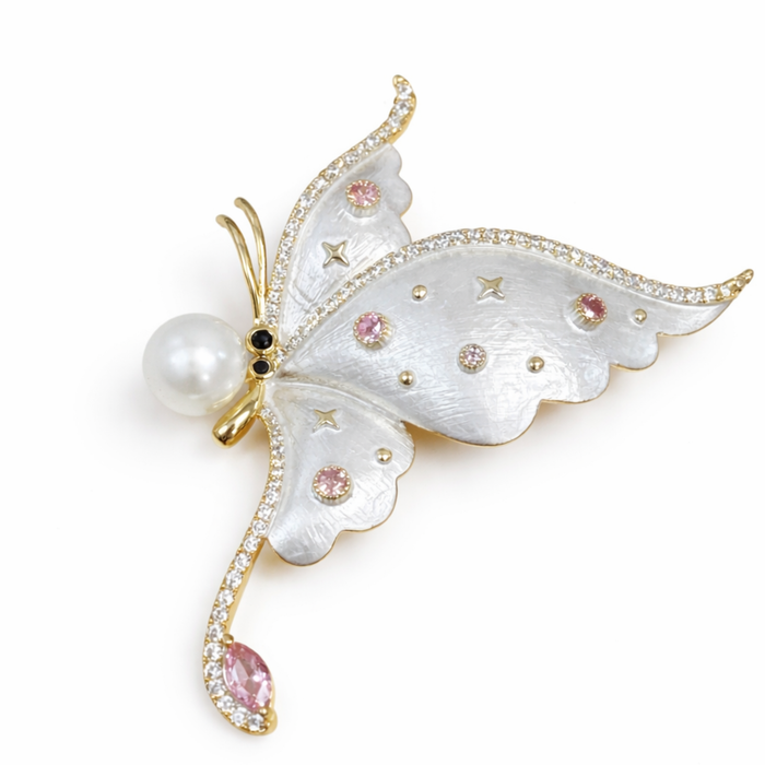 Colorful blinged butterfly brooch by Private Label featuring multicolor rhinestones on a decorative metal pin.