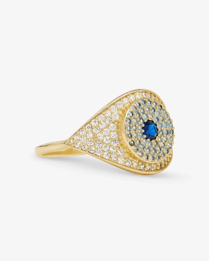 Gold evil eye ring by Melinda Maria, showcasing a detailed jewelry ring with an eye-shaped design in a shiny gold finish.