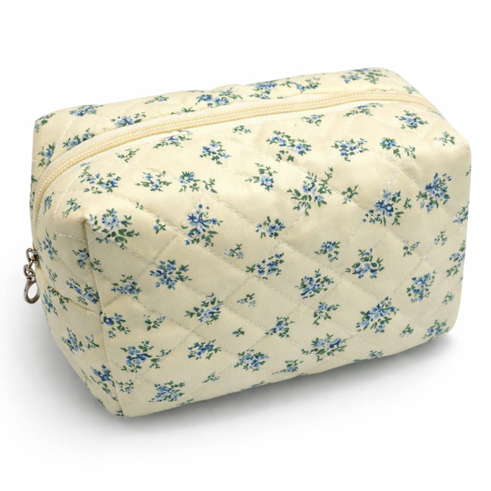 Private label floral toile pattern makeup cosmetic pouch bag with colorful floral design and zipper closure.
