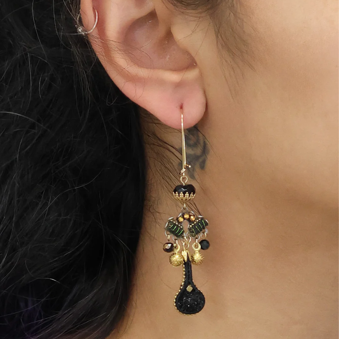 Gilded Black Set Vuloria Earrings by Ayala Bar featuring intricate design and elegant black accents.