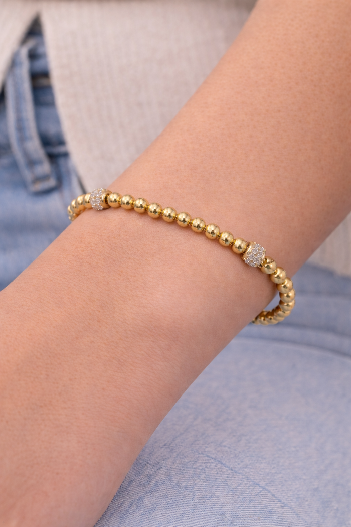 Gold beaded bracelet with silver CZ spacers from The Skylar Project, featuring a stylish and elegant design.
