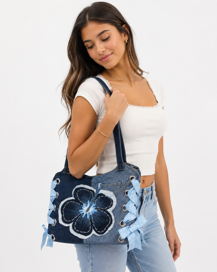 Hand-made two-toned floral denim bag by Gianna Valente x Lets Bag It featuring vibrant floral patterns and sturdy denim material.