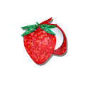 A strawberry-shaped compact mirror with a textured red body, green leaves, and a silver mirror visible inside, set against a plain white background.