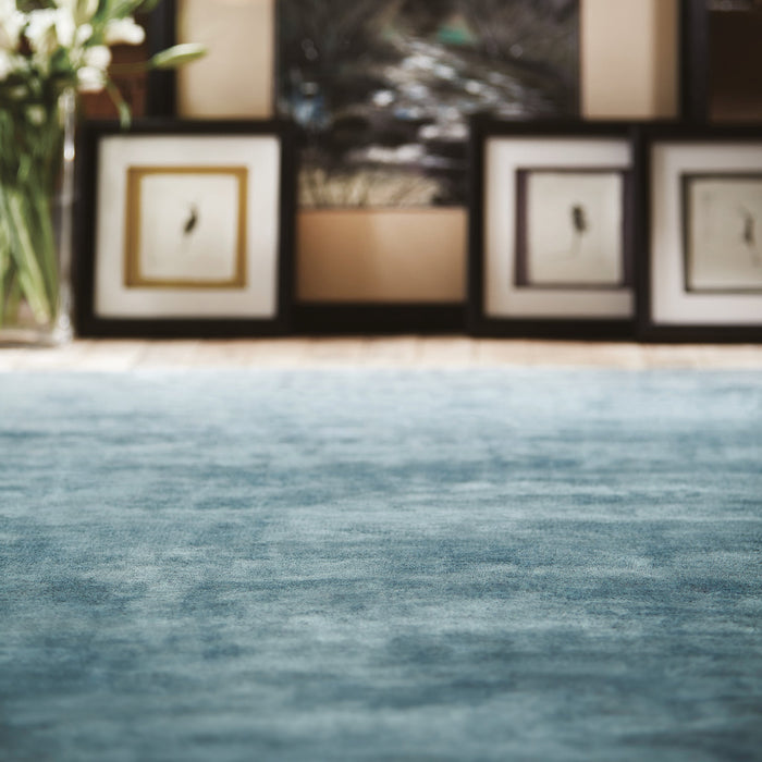 Karma Aegean Rug made from 100% viscose, featuring different shades of blue.