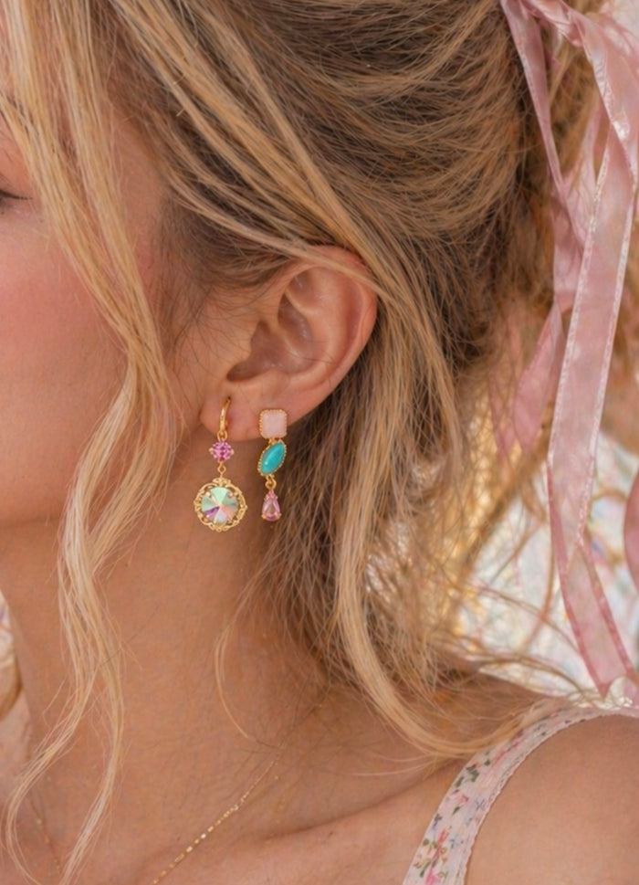 Sorrelli Indie dangle earrings with intricate silver-toned designs and colorful gemstone accents, hanging gracefully.