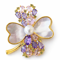 Private label Lucky Bloom Clover brooch featuring a detailed green clover design on a shiny metal pin.