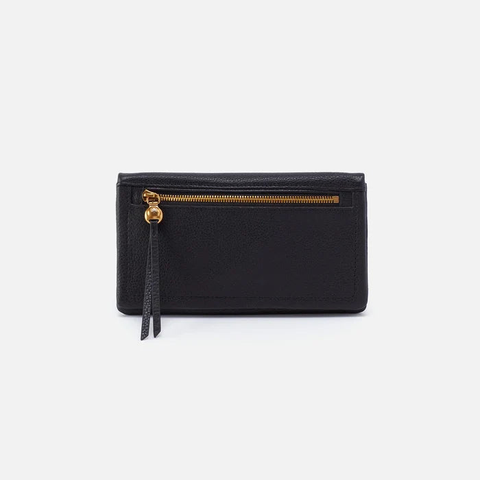 Black HOBO Lumen Continental Wallet, showcasing sleek design and multiple card slots on a flat surface.