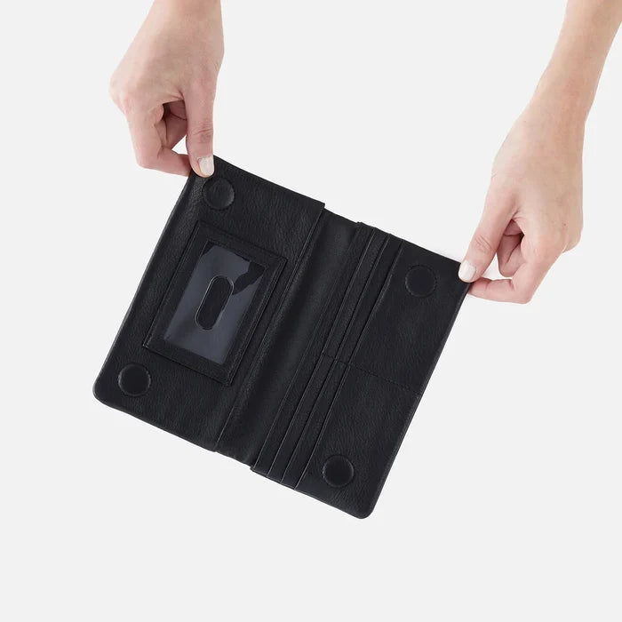 HOBO Lumen Continental Wallet in black, showcasing sleek design, multiple card slots, and zip-around closure.