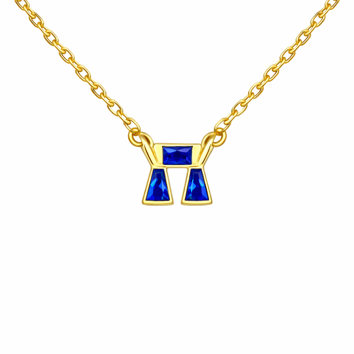 Mini blue CZ chai necklace by Private Label featuring a small blue cubic zirconia pendant on a delicate chain