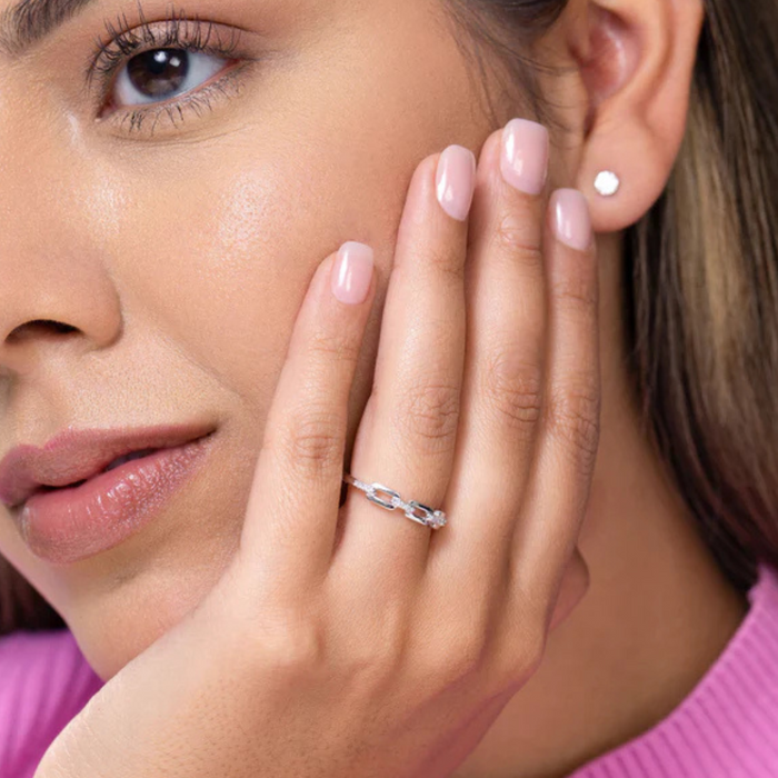 Mini-link stackable ring in rhodium plated sterling silver by M by Monte Luna, featuring a sleek and modern design.