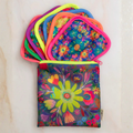 Natural Life mini makeup removing cloths set with floral patterns inside a small makeup bag, perfect for skincare and travel.