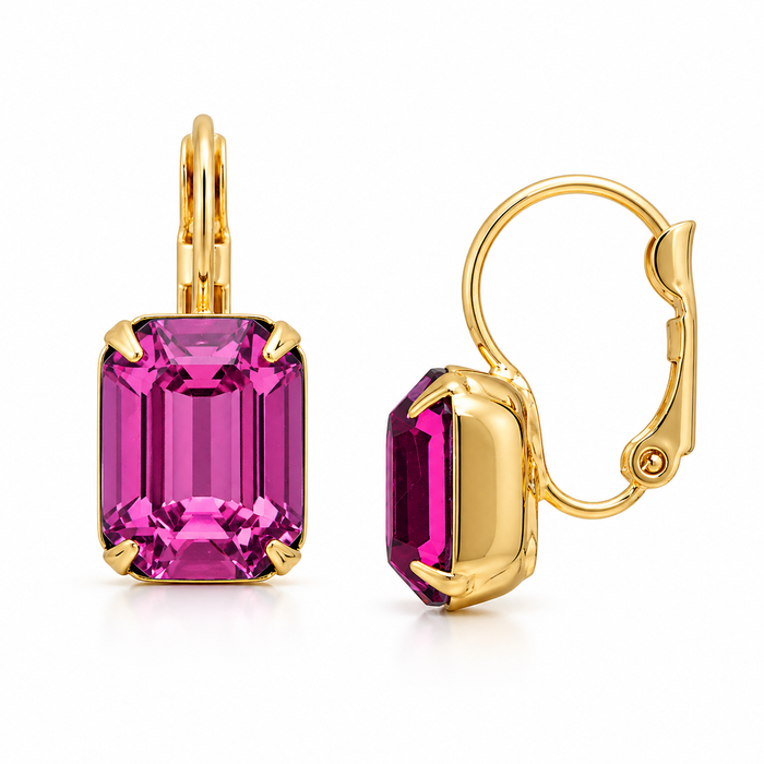 Sorrelli Octavia dangle earrings with intricate metal and gemstone details hanging from ear hooks.