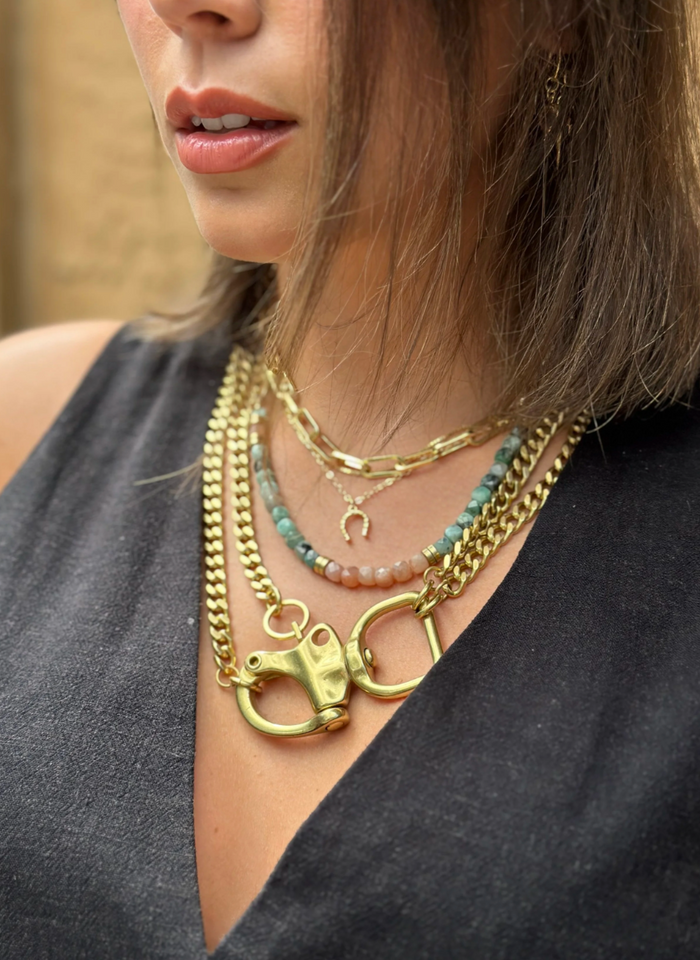 Peach moonstone and emerald curb necklace by Rachel Nathan, 20 inches long, showcasing elegant gemstone design.