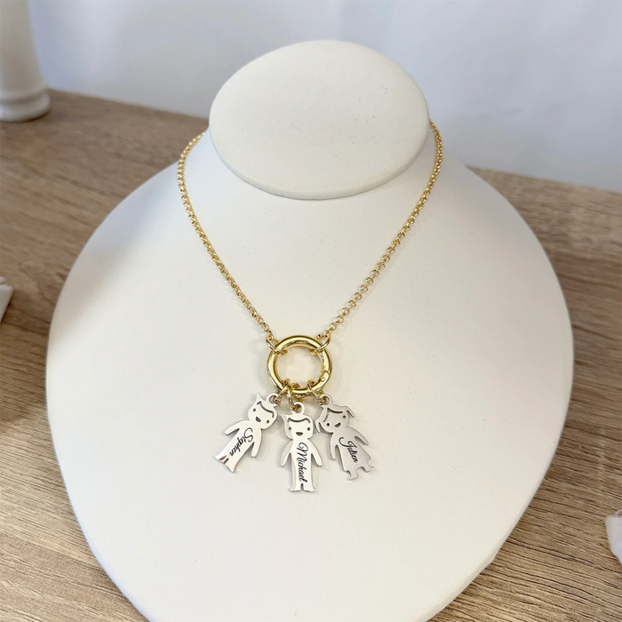 Personalized Grandma Kids Charm Necklace by Love Lisa featuring a heart and bow pendant with customizable charms.