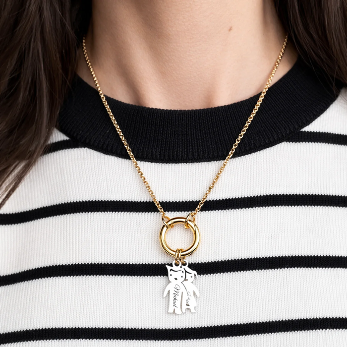 Personalized Grandma kids charm necklace with heart and bow design from Love Lisa, featuring a delicate chain and custom engraved pendant.