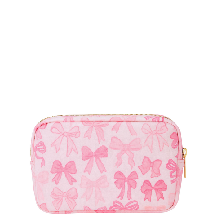 Pink nylon bow makeup bag by Lil Darlings featuring a stylish bow detail and spacious interior for cosmetics and beauty essentials.