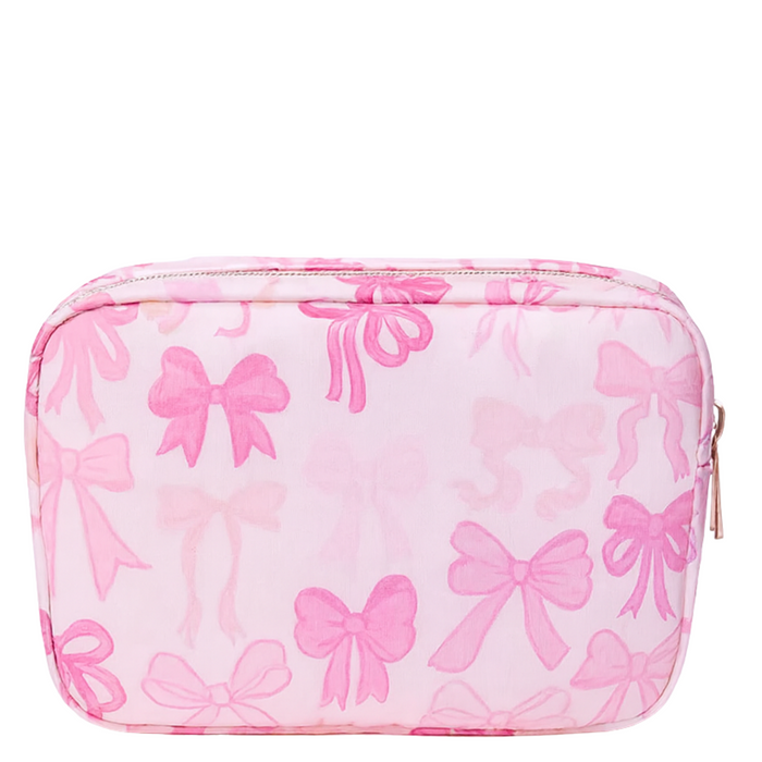 Pink nylon bow makeup bag from Lil Darlings featuring a stylish bow design and spacious interior for cosmetics.
