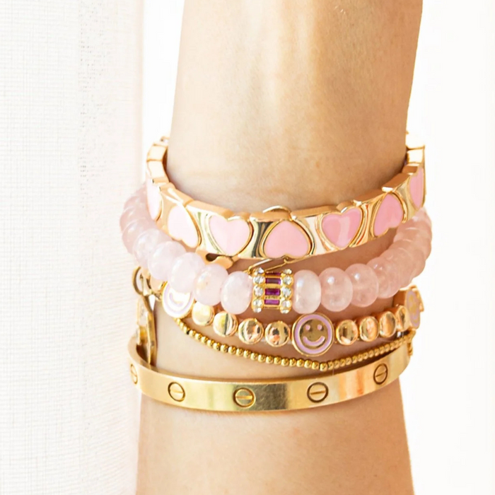 Pink stackable bracelet featuring Dottie Smiley designs by la lumiere ny, showcasing a playful and colorful aesthetic.