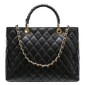 Quilted genuine leather tote bag with sturdy straps, stylish and spacious handbag accessory by Private Label.