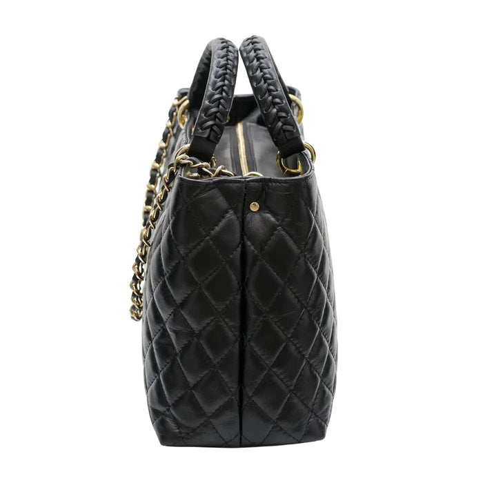 Quilted genuine leather tote handbag with top handles, stylish and spacious, by Private Label, perfect for everyday use.