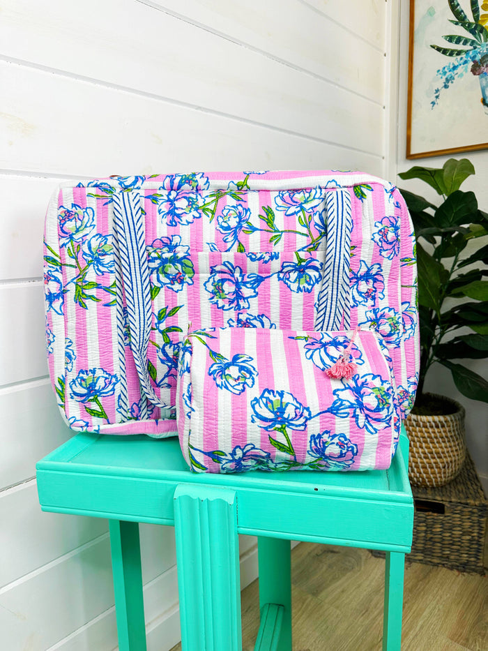 Quilted peony pink striped makeup bag by Folklore Couture, featuring a stylish design for cosmetics storage.