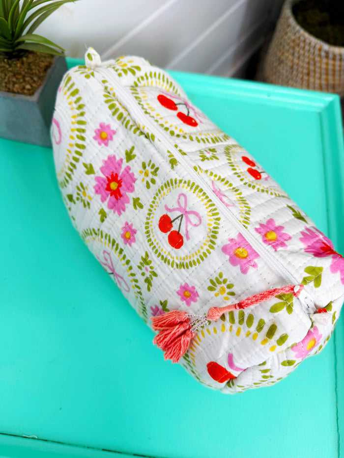 White quilted makeup pouch with cherry and bow embroidery by Folklore Couture, stylish cosmetics bag with a charming design.