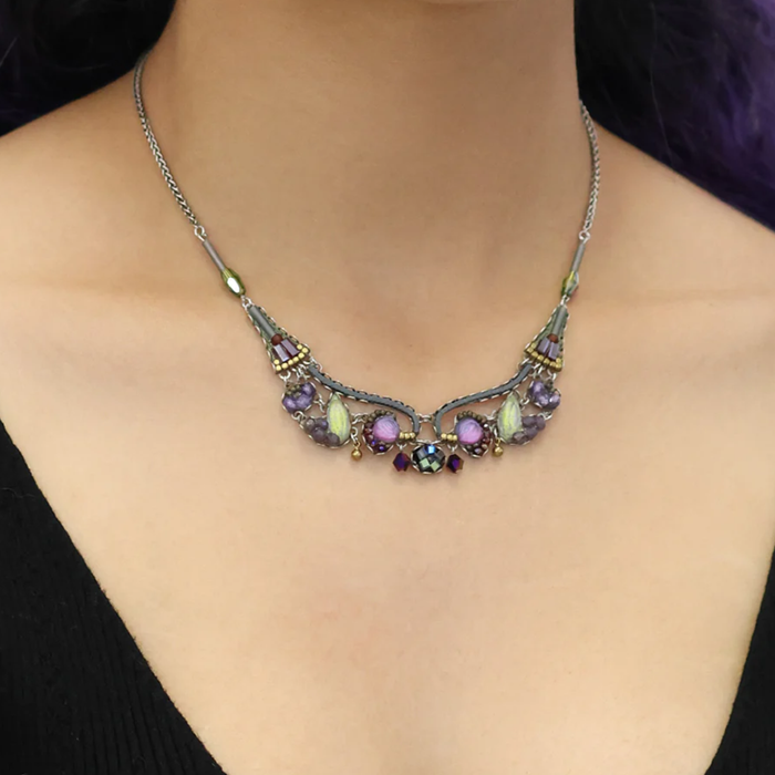 Ayala Bar Twilight Necklace from the Silent Shadows Set featuring intricate designs and vibrant colors.