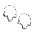 Silver slip hoop earrings by private label, showcasing a sleek and modern design with a polished finish.