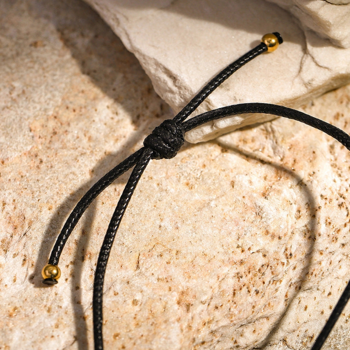 Simple round cutout titanium necklace from Private Label with a sleek, minimalist design and a smooth, polished finish.
