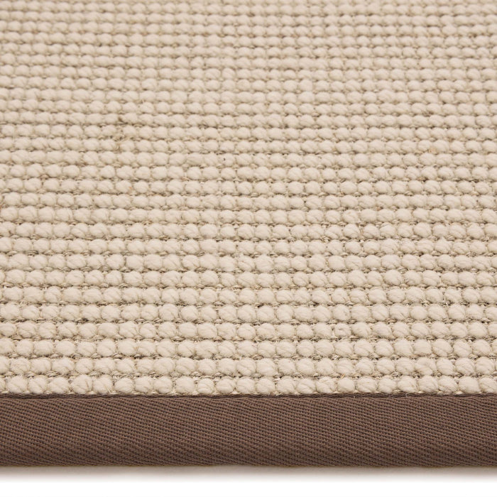 Sisal Boucle Mocha Rug made from 100% wool with a solid brown border.