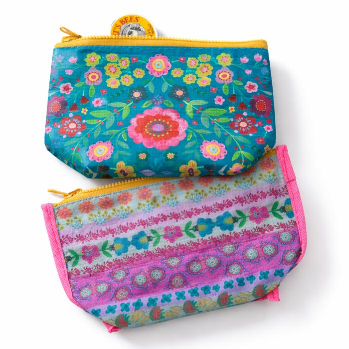 Small recycled zipper pouch from Natural Life with colorful eco-friendly fabric and a metal zipper closure.