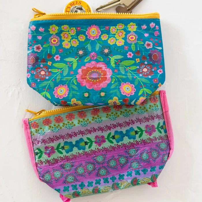 Small recycled zipper pouch by Natural Life, eco-friendly fabric with colorful floral pattern and durable zipper closure.