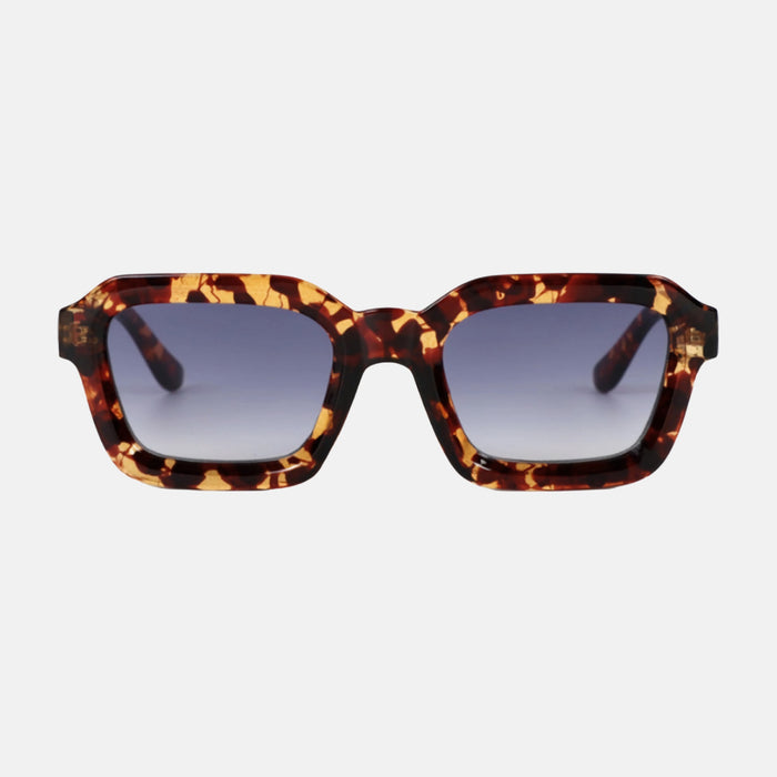 oculos cruz sol leopardo frente
