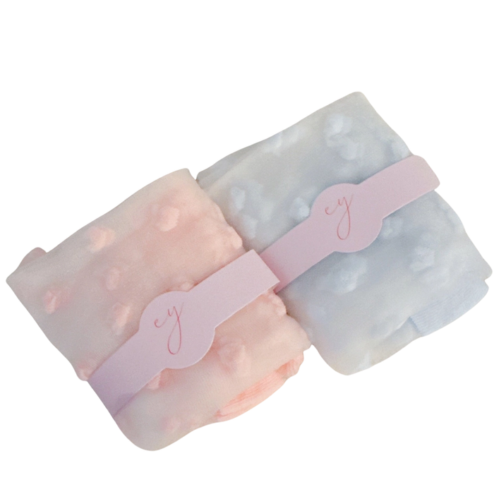Set of two Ellison + Young Sweet Hearts sheer socks with cute heart and bow designs, perfect for a stylish, feminine look.