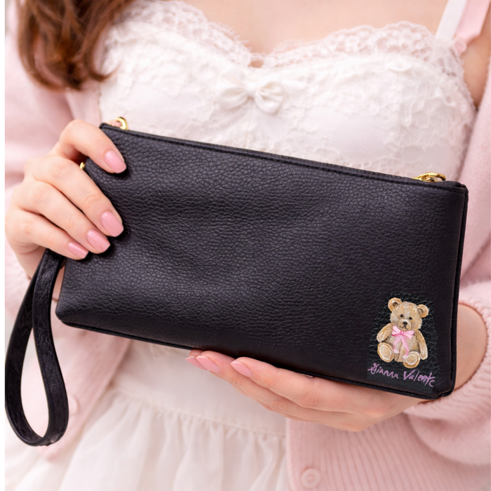 Hand-painted wristlet from Gianna Valente x Lets Bag It collection, showcasing vibrant artwork on a stylish wristlet accessory.