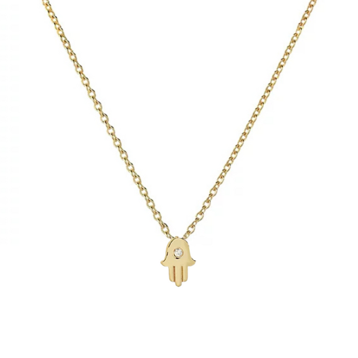 Tiny Hamsa necklace with CZ stone, delicate design, featuring a charm on a fine chain, showcased against a neutral background.