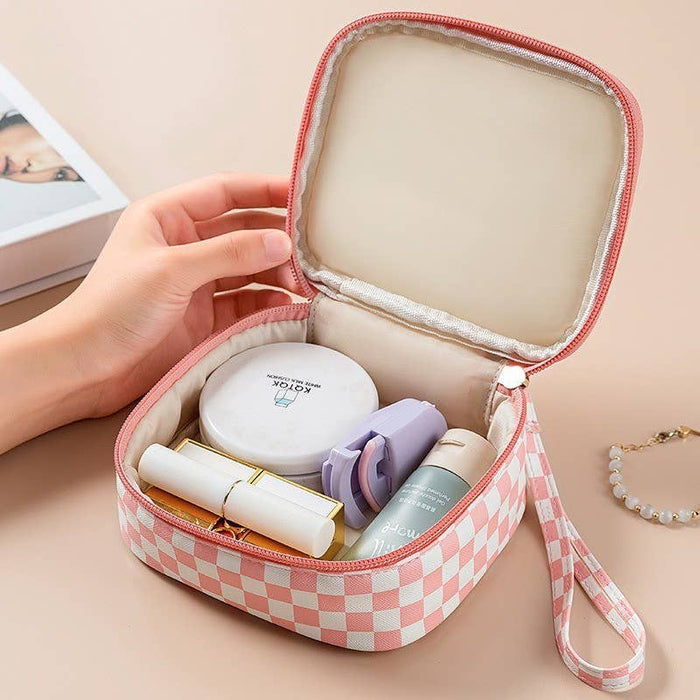 Travel checker makeup cosmetic pouch bag by Private Label, featuring a compact design with a zipper closure and stylish pattern.