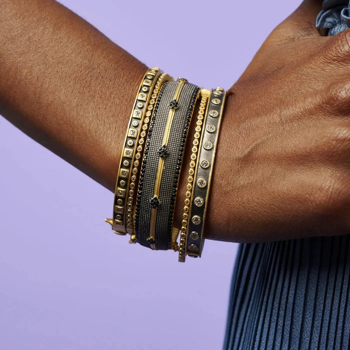 Freida Rothman Windows of the City Hinge Bangle bracelet featuring a sleek, modern design with elegant detailing.